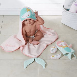 baby bath set Pink terry hooded towel with a mermaid face mint colored hair and gold lame star plus a mint mermaid tail, Mint terry bath mitt with a mermaid applique on the front with pink hair a gold lame star gold top and mint mermaid tail, Pair of white spa slippers with pink trim and gold lame stars