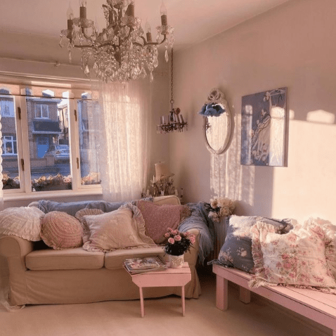 shabby chic sofa in a cottage living room with golden hour sunlight