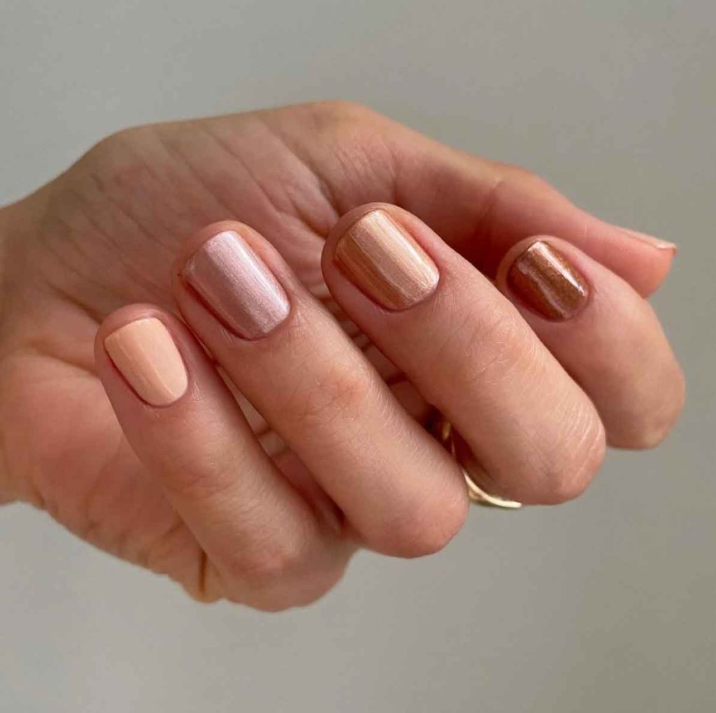 nude ombre nails with glitter
