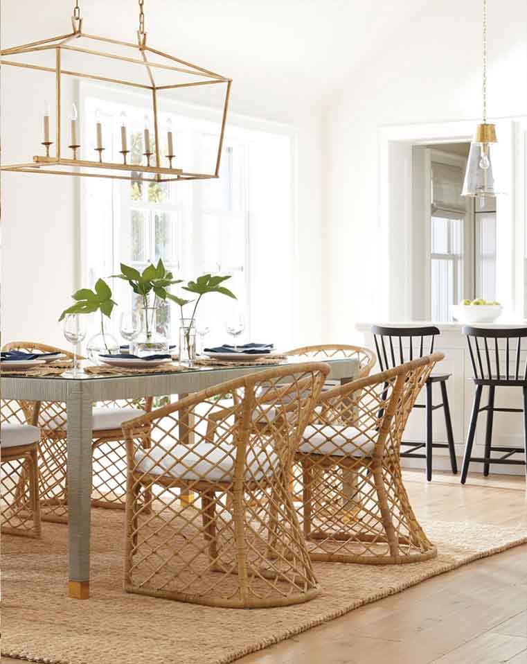 Avalon rattan dining chairs with cushions. Serena and lily