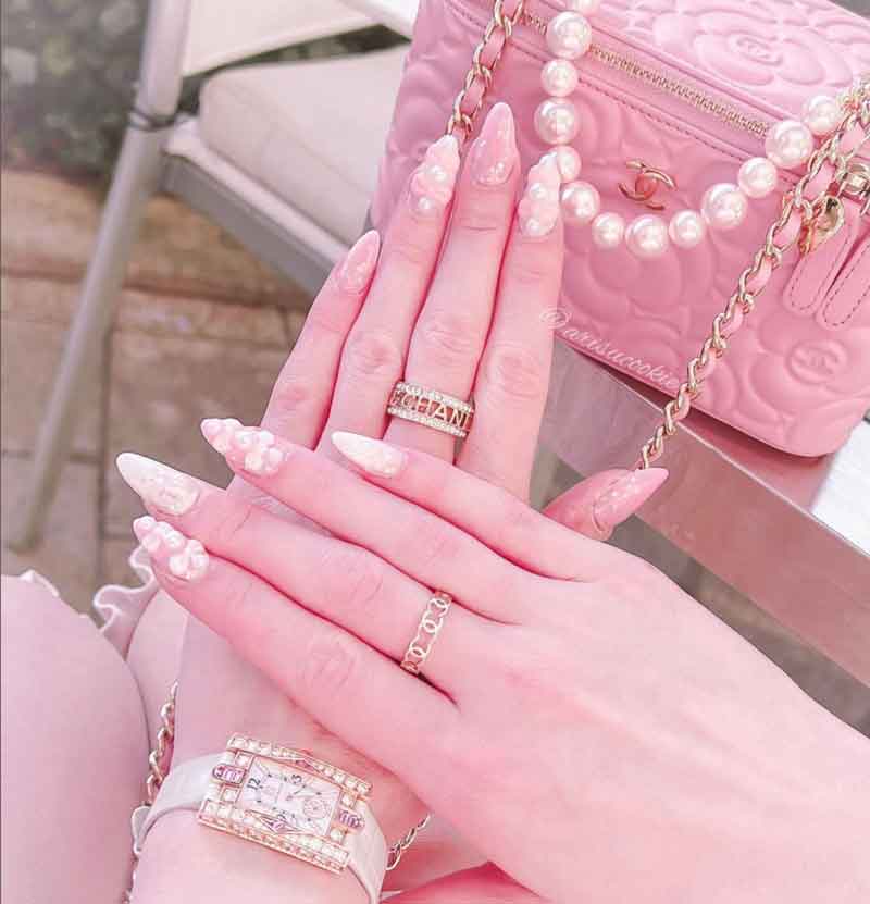 light pink nails with rhinestone and pearls