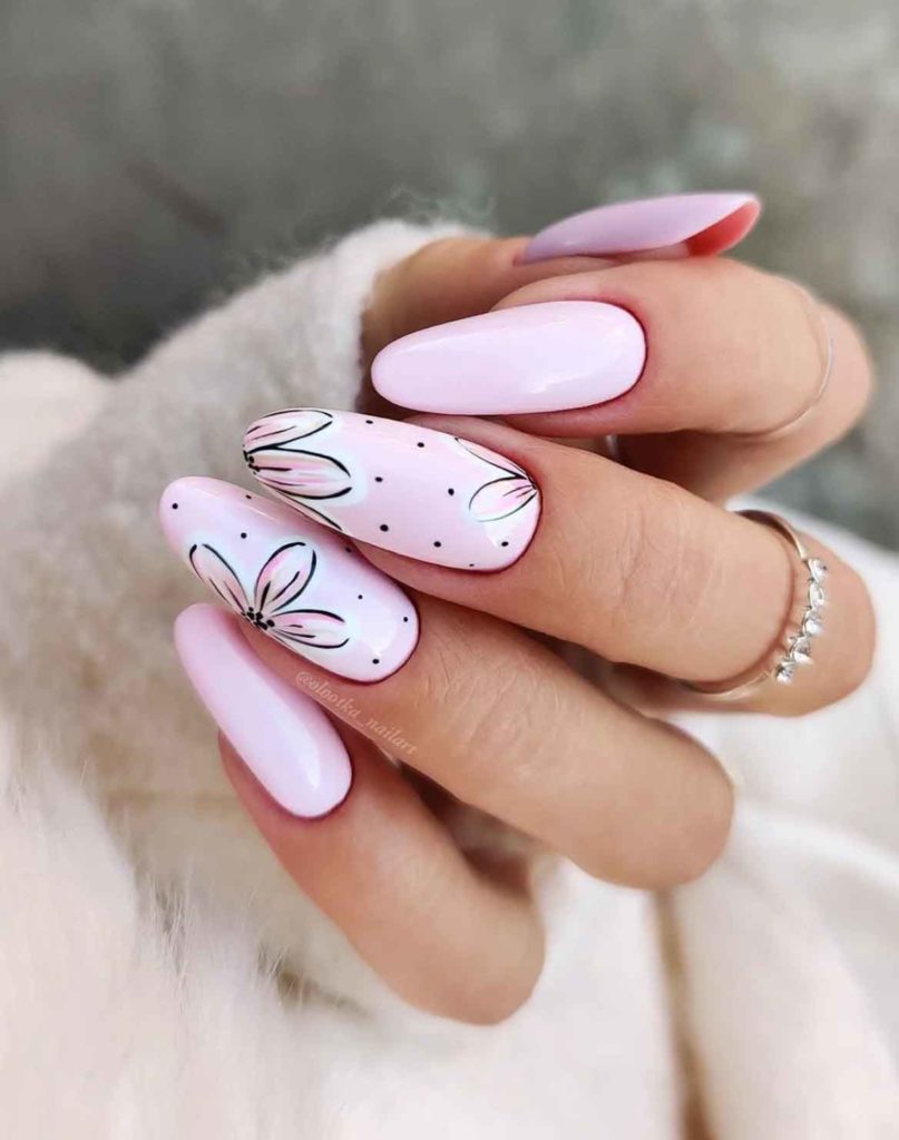 almond long light pink nails with floral design
