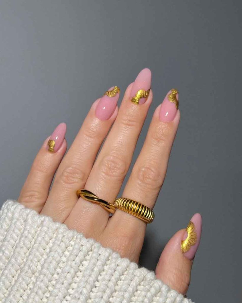 very light pink and gold nails